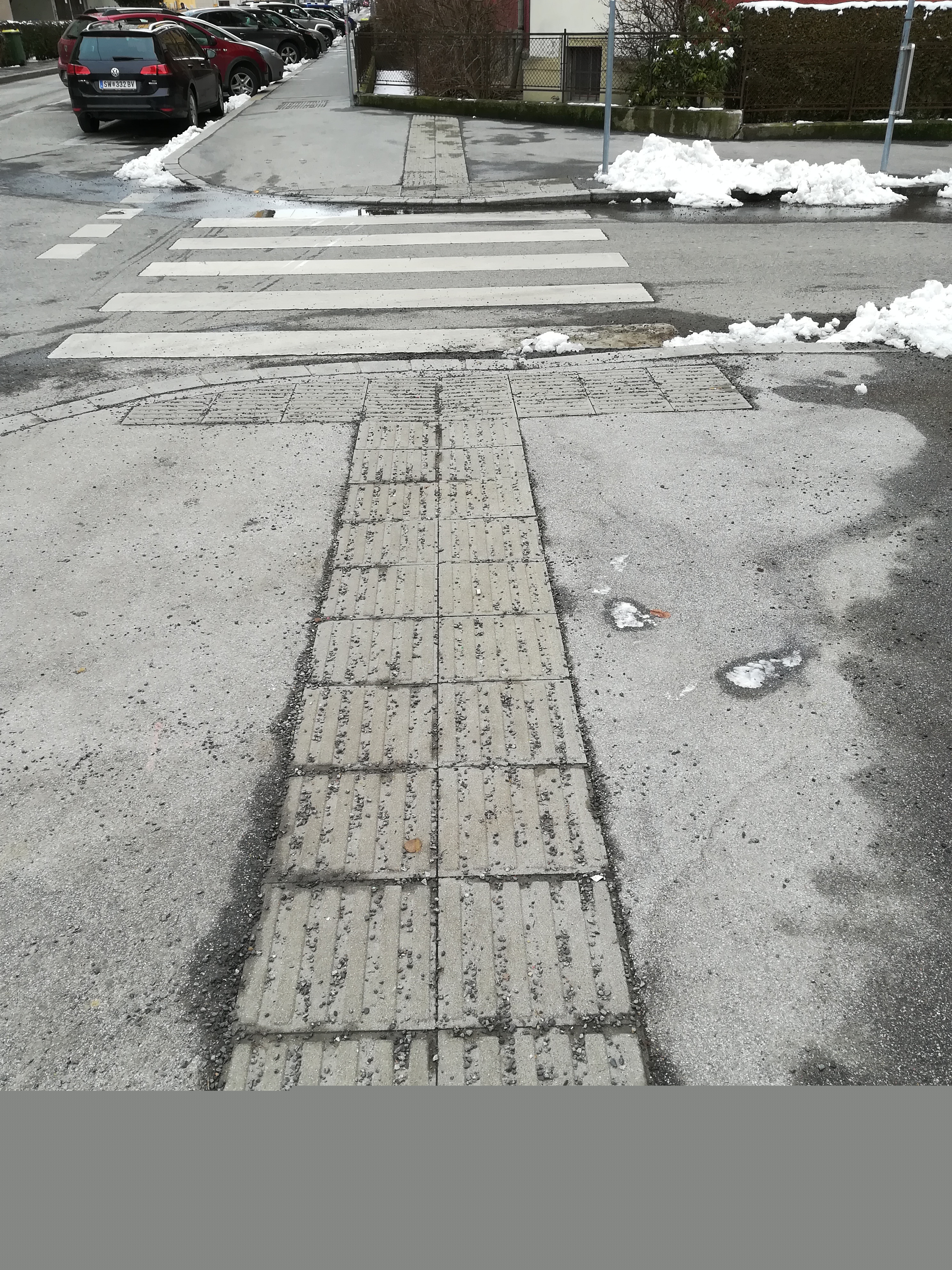 Loose gravel is covering the guiding lines in Winter